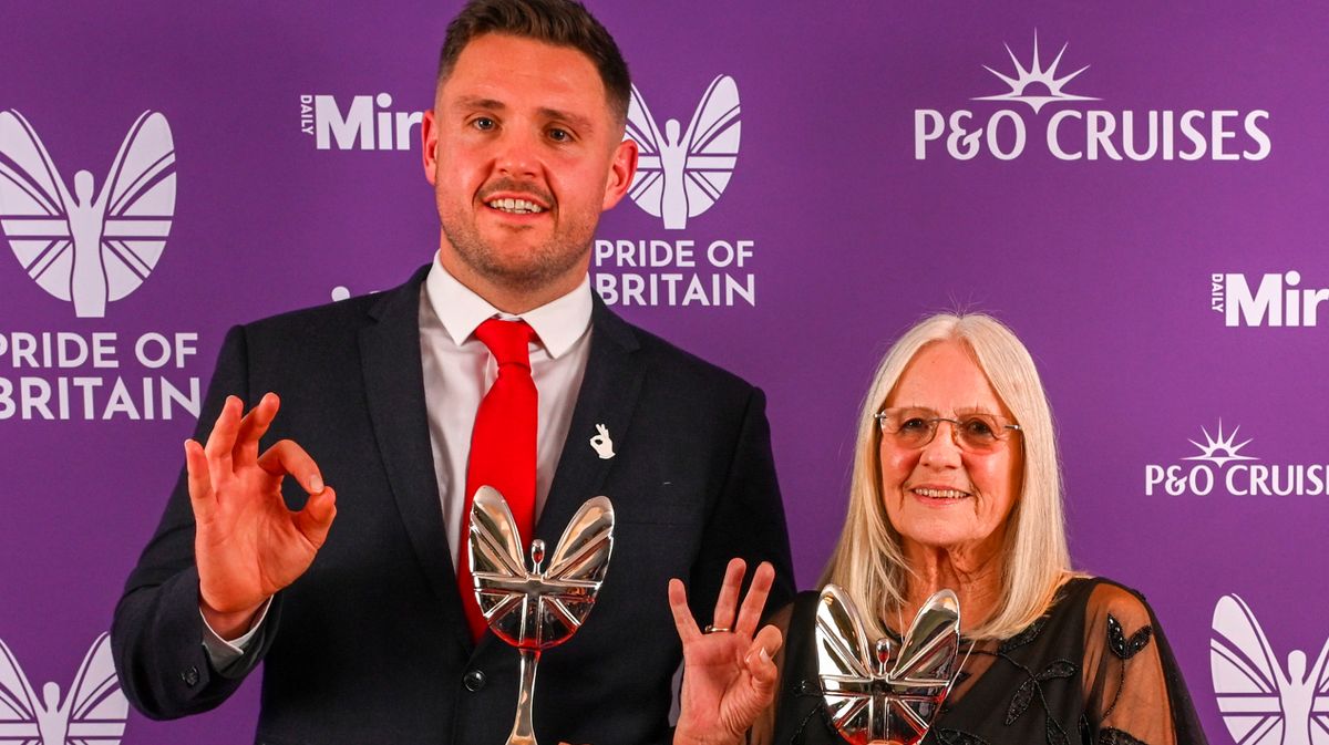 Luke Ambler and Elaine Roberts receive their Pride of Britain award