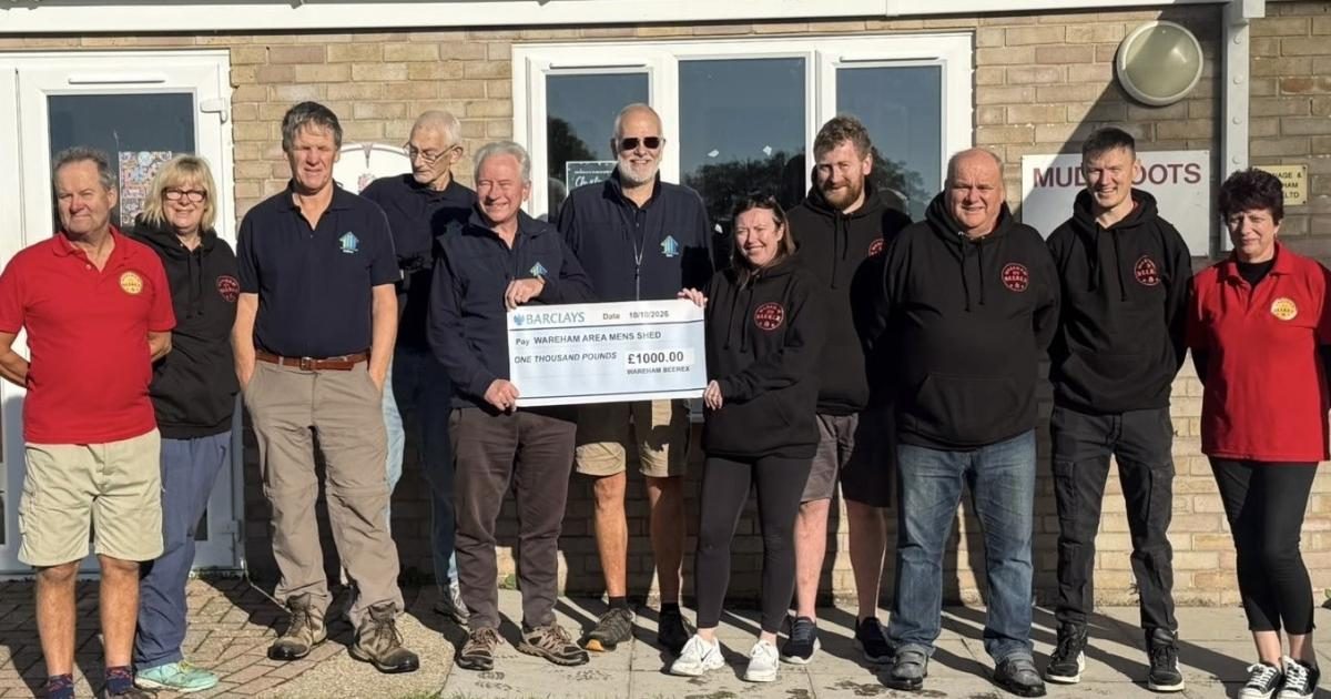 Beerex cheque handover to Wareham Area Men’s Shed at the rugby club